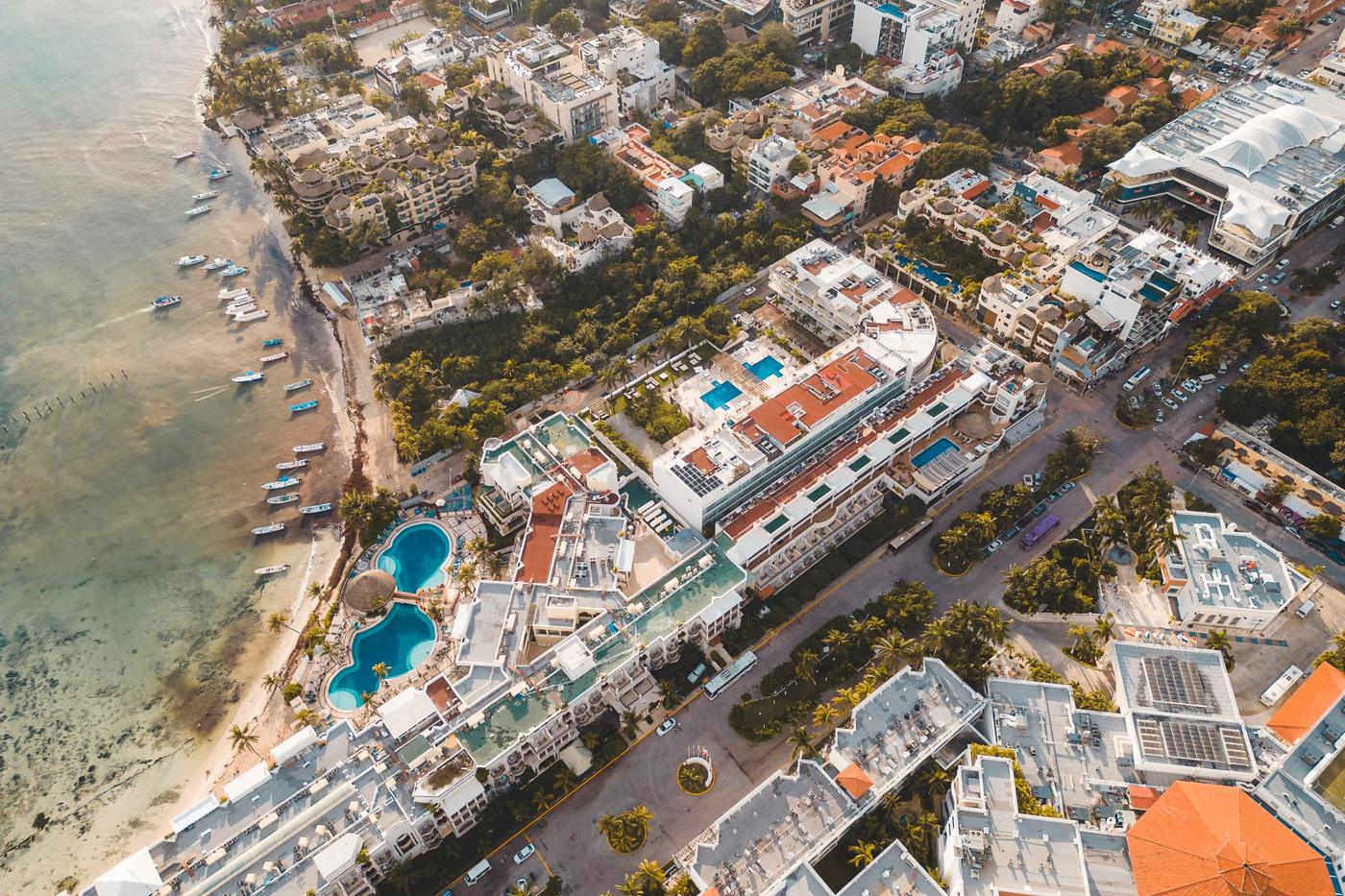 Aerial view of the streets, hotels and shoreline of Playa del Carmen